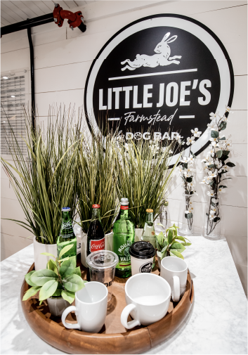 wall with sign on it behind a decorative tray